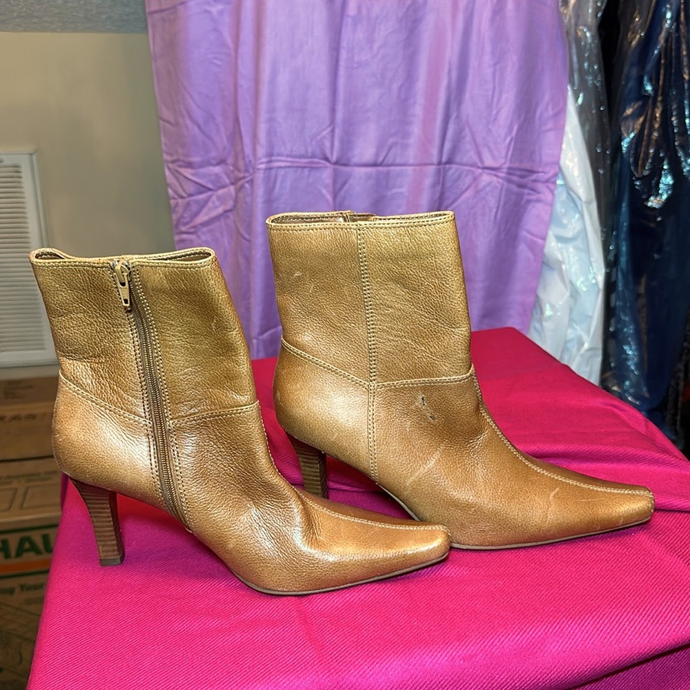 NWOT leather boot with 3-1/2” heel. Size 7. Brown